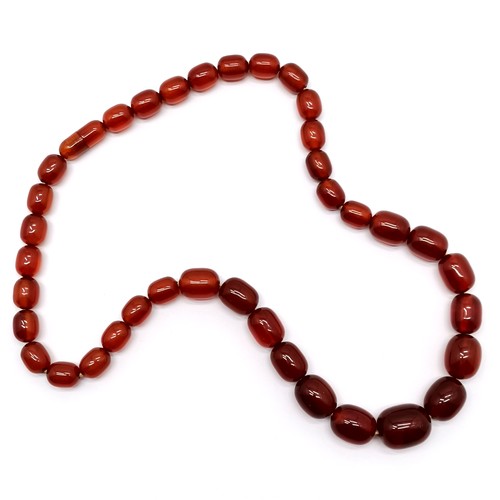 633 - Strand of graduated amber beads - 52cm & 45g ~ clasp secures but is a/f