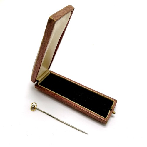 653 - Antique diamond set tie-pin with unmarked gold head in original retail box - SOLD ON BEHALF OF THE N... 