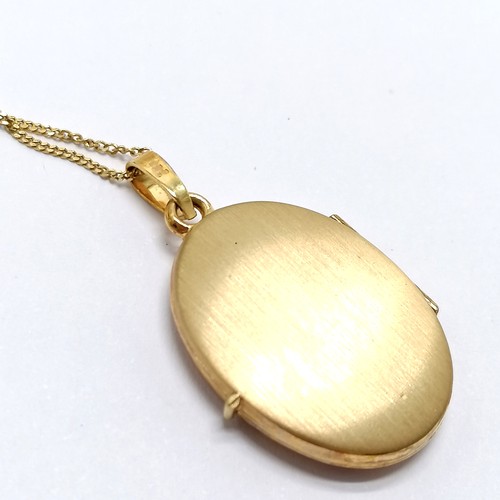 659 - 9ct hallmarked gold oval locket on a 9ct marked gold 44cm fine chain - total weight 2.9g - SOLD ON B... 