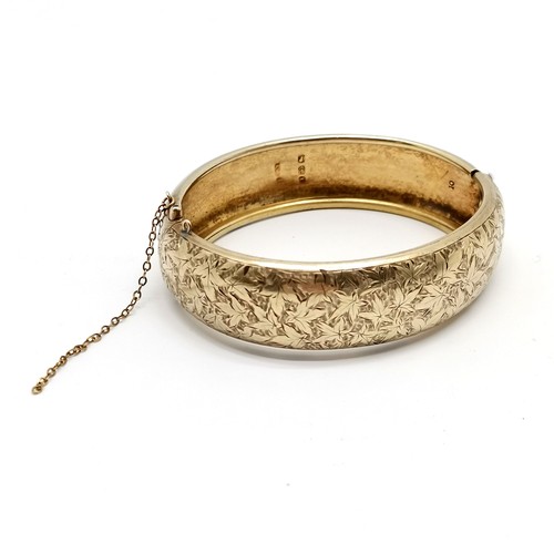 665 - c.1880's Victorian silver gilt bangle with engraved detail to front & unusual J M Banks patent clasp... 