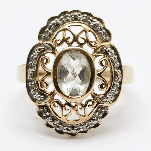 673 - 9ct hallmarked gold aquamarine & diamond cluster ring - size O & 3.2g total weight