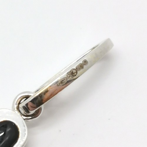 675 - 18ct hallmarked white gold onyx & diamond set long pendant - 5cm & 3.9g total weight