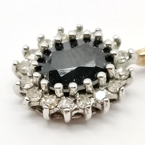 696 - 9ct hallmarked gold sapphire / diamond cluster pendant - 1.6cm drop & 1.2g total weight