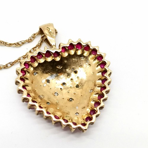 701 - 9ct hallmarked gold ruby & diamond set heart pendant (2.5cm drop) on a 9ct marked gold 46cm neckchai... 