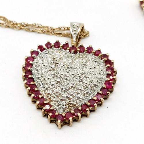 701 - 9ct hallmarked gold ruby & diamond set heart pendant (2.5cm drop) on a 9ct marked gold 46cm neckchai... 