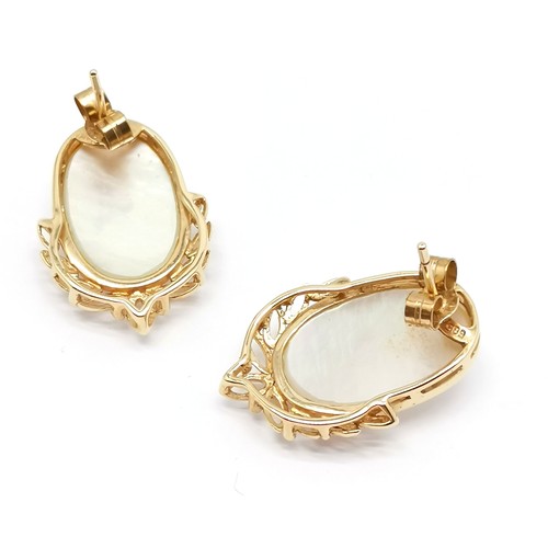 783 - Pair of 14ct marked gold mabe pearl earrings - 2.2cm drop & 4.6g total weight