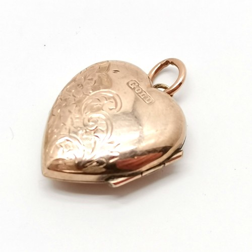 789 - Rose gold marked heart shaped locket with engraved detail - 2.5cm drop & 2.2g total weight ~ some de... 