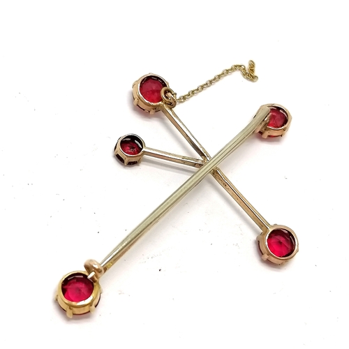 806 - Antique 9ct marked gold crux / southern cross bar brooch set with red stones - 4.5cm & 2.4g total we... 