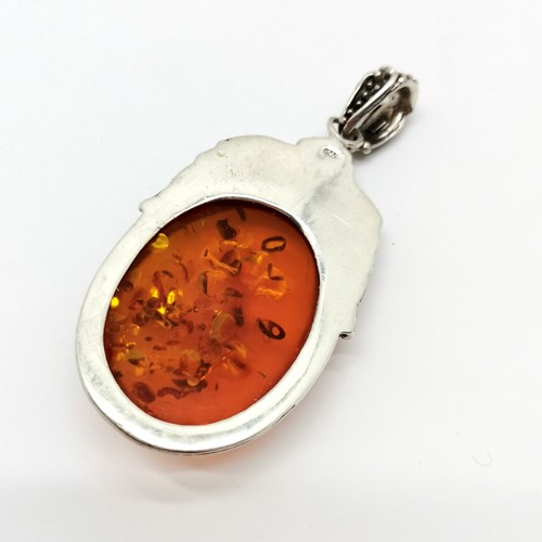 828 - Large silver marked amber pendant - 7cm & 26g total weight