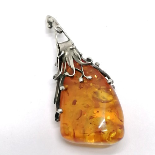 832 - Large silver mounted amber pendant - 8cm & 29g total weight