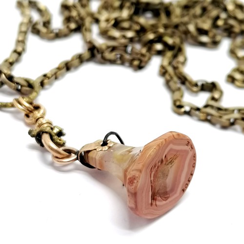 841 - Antique muff chain with unmarked gold mounts & agate seal pendant 'Follow me' (pin a/f) - 140cm long