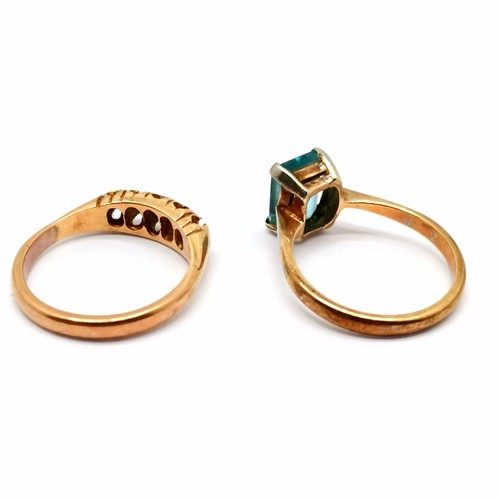 856 - 2 x unmarked gold rings - diamond (missing 1 stone) & blue topaz ring - total weight (2) 4.8g & both... 