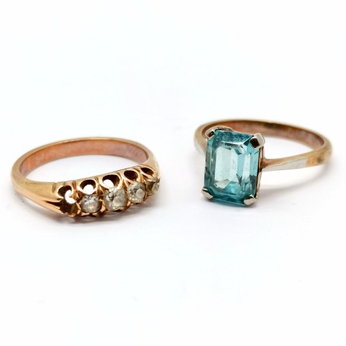 856 - 2 x unmarked gold rings - diamond (missing 1 stone) & blue topaz ring - total weight (2) 4.8g & both... 