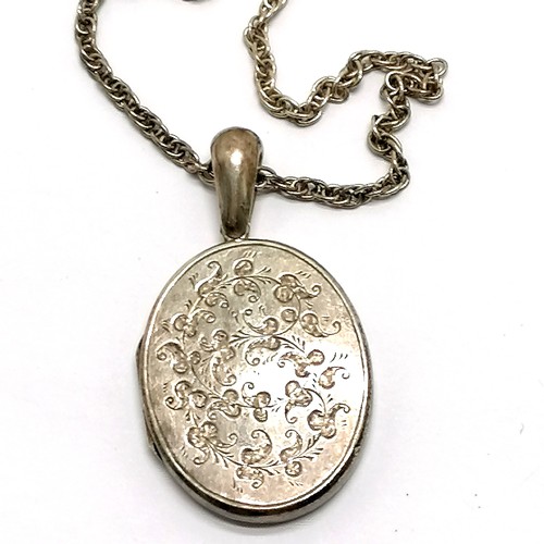 859 - Antique Chester silver oval locket pendant (5cm) on silver marked 56cm chain - 22g & some dents to r... 