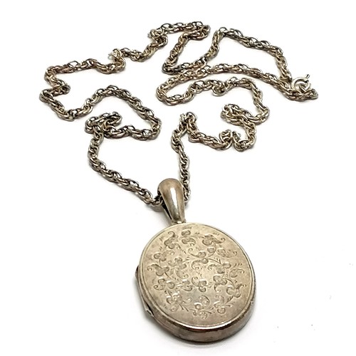 859 - Antique Chester silver oval locket pendant (5cm) on silver marked 56cm chain - 22g & some dents to r... 