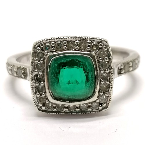 879 - 9ct hallmarked white gold green tourmaline (?) / diamond stone set cluster ring with diamond set sho... 