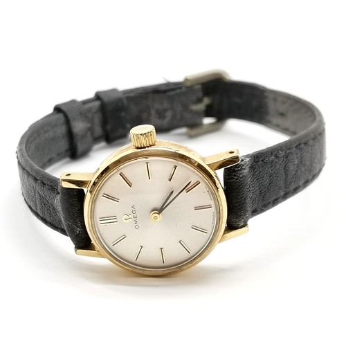 884 - Ladies Omega manual wind wristwatch in a 20mm gold plated case with #620 movement & running at time ... 