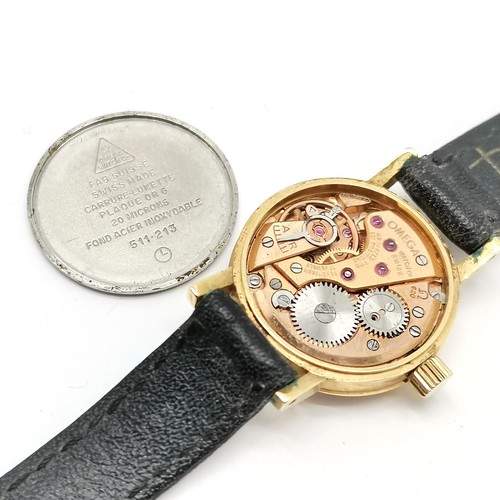 884 - Ladies Omega manual wind wristwatch in a 20mm gold plated case with #620 movement & running at time ... 