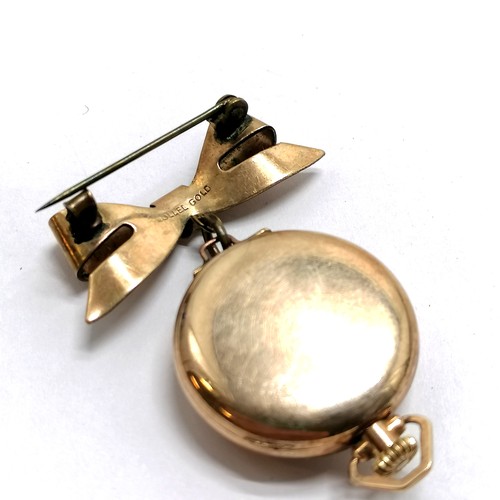 898 - Awoner rolled gold manual wind brooch watch with bow suspender - 4.5cm drop & running at time of lis... 