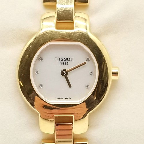 907 - Tissot 1853 gold tone ladies quartz wristwatch with mother of pearl dial #G330K in original retail b... 