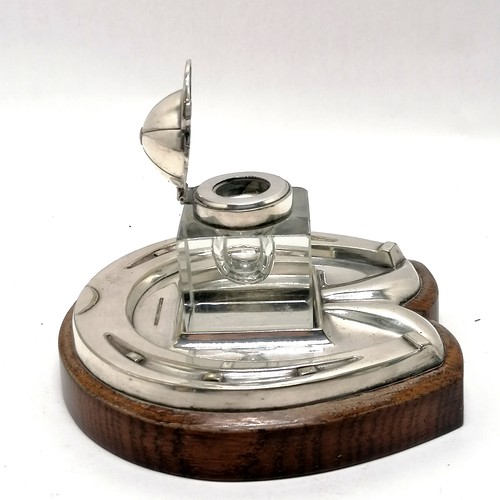 963 - Daniel & Arter silver plated horseshoe stand with glass inkwell with jockey cap hinged lid - 14cm x ... 