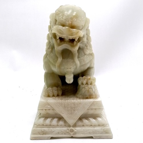 11 - Oriental Chinese hand carved soapstone lion dog on plinth - 21cm high x 13.5cm x 18cm