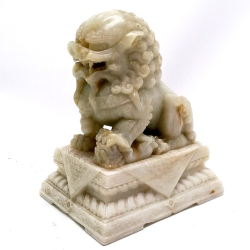 11 - Oriental Chinese hand carved soapstone lion dog on plinth - 21cm high x 13.5cm x 18cm