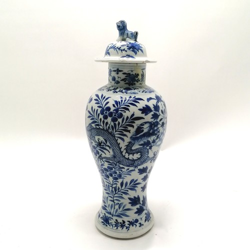 13 - Antique Chinese Kangxi blue & white vase with dragon decoration and fo dog finial to lid and has 4 c... 