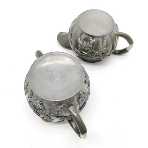 26 - Oriental antique unusual figural handle with cabochon stone set detail (15cm) t/w pewter stone set t... 