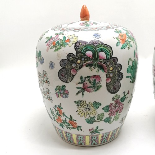 46 - Pair of famille rose lidded jars 30cm high with character marks to the base of one - no obvious dama... 