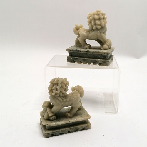 65 - Pair of Chinese carved soapstone lion dogs - 11cm high x 9cm x 5cm ~ both have some dints