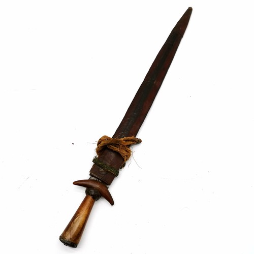 74 - Antique African Guduf sword (Mandara mountains) with horn hilt and leather over wood scabbard with c... 