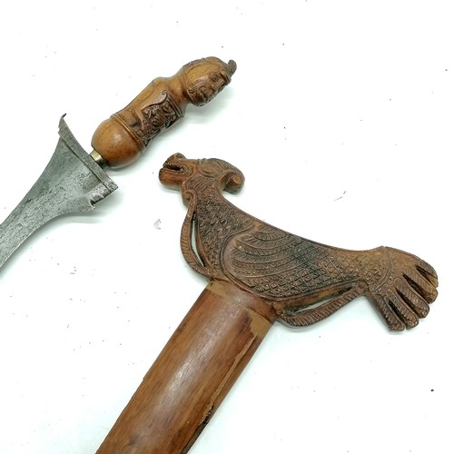 93 - Antique Javan madura kris / keris with ogre detail handle in a carved wooden sheath with zoomorphic ... 