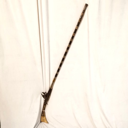 105 - Antique Moroccan Altit snaphaunce long gun with unmarked silver mounts and inlay detail - 158cm long... 