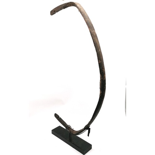 106 - Manchurian Chinese 18th century recurve bow mounted on a black stand, has part of the import seal re... 