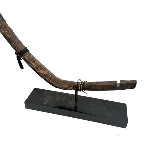 106 - Manchurian Chinese 18th century recurve bow mounted on a black stand, has part of the import seal re... 