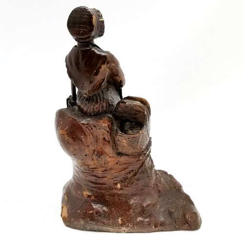 121 - Folk art antique wooden root carving of a seated old lady - 26cm high and has losses & signs of old ... 