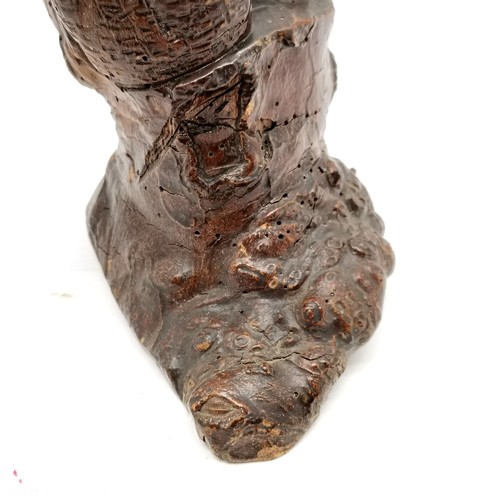 121 - Folk art antique wooden root carving of a seated old lady - 26cm high and has losses & signs of old ... 