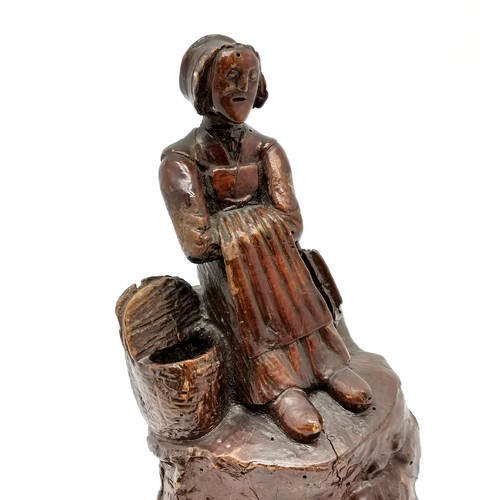 121 - Folk art antique wooden root carving of a seated old lady - 26cm high and has losses & signs of old ... 