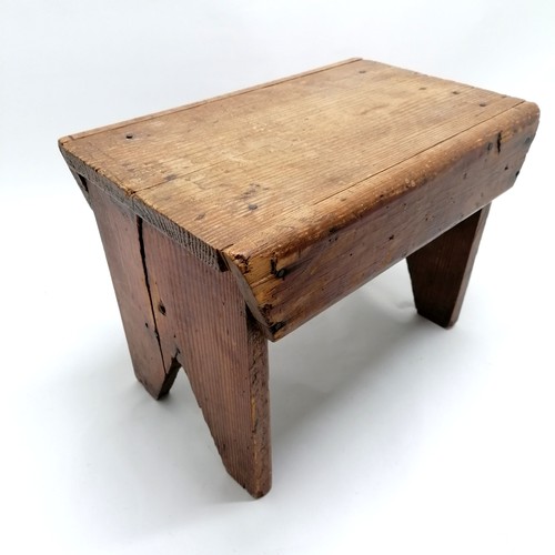 137 - 2 x small antique rustic pine stools - largest 29.5cm high x 40cm x 26cm and both have splits to the... 