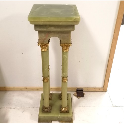 140 - Antique decorative onyx pedestal incorporating 4 decorative columns with ormolu mounts terminating w... 