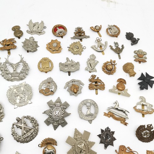 170 - Large collection / qty of military cap badges