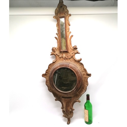 195 - Antique mahogany carved mirror ( was originally a barometer case) 115cm long x 48cm wide