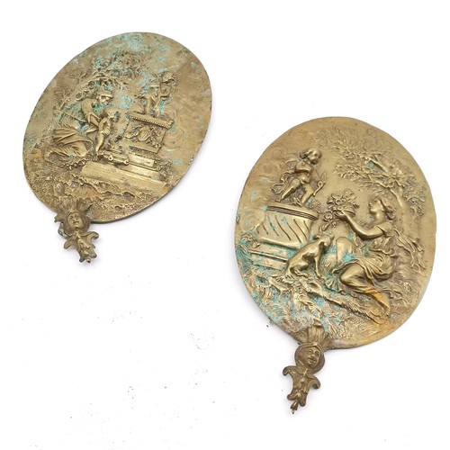 206 - Antique pair of brass classical wall decorations depicting Cupid etc (30cm x 19cm) t/w cast iron cir... 