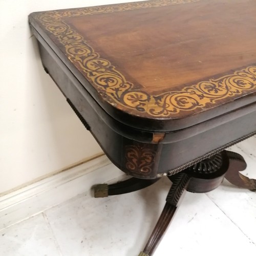 246 - Antique mahogany fold over card table with pedestal base terminating on 4 sabre legs with the origin... 