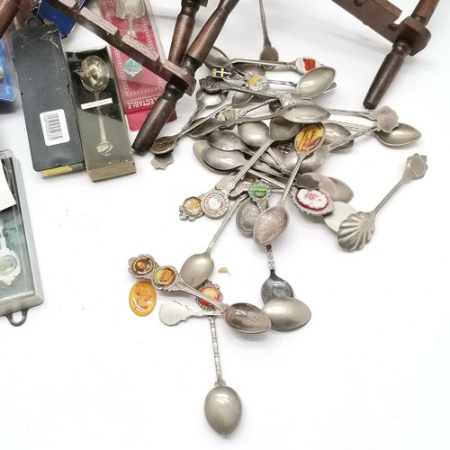 252 - Quantity of collectors spoons mostly boxed T/W wooden racks largest 70cm high x 41cm x 13cm deep