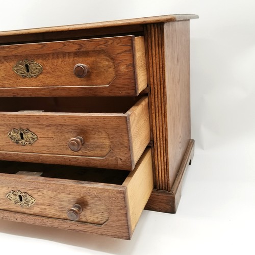 257 - Continental oak 3 drawer cabinet on bracket feet with brass escutcheons and reeded detail - 50cm x 3... 