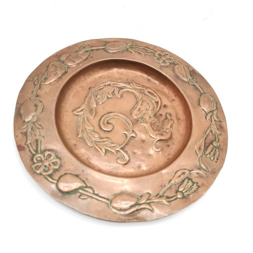 277 - Arts & Crafts antique hand worked copper dish with embossed mythical creature design - 18cm diameter