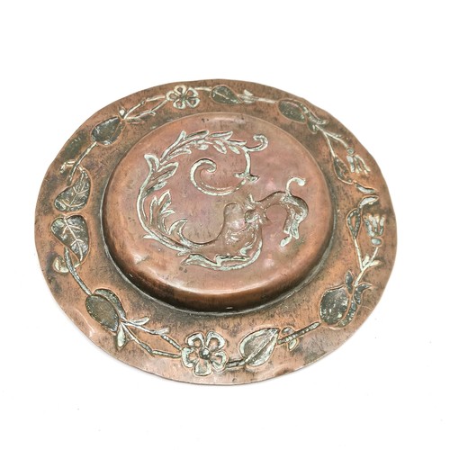 277 - Arts & Crafts antique hand worked copper dish with embossed mythical creature design - 18cm diameter