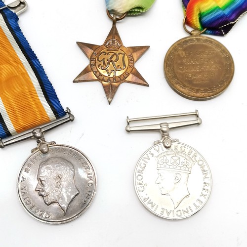 299 - WWI pair of medals (27682 SJT D C JONES R W FUS) + 'Service wounded stripe', dog / ID tags, WWII med... 